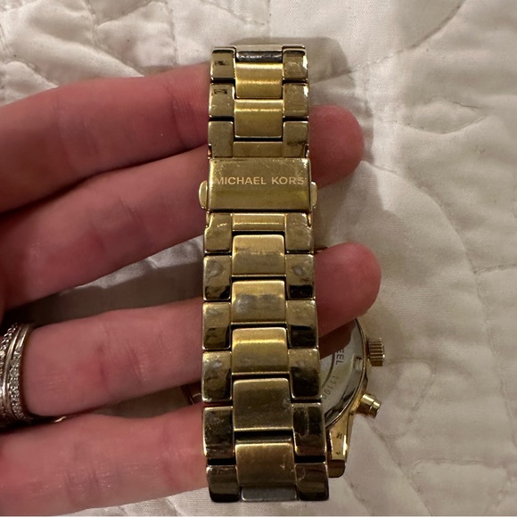 Michael Kors gold watch with stone bezel
